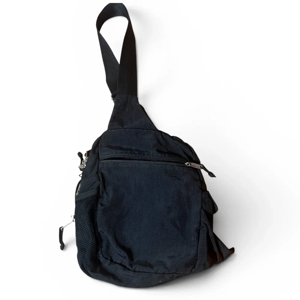 Baggallini Black Sling Bag Adjustable Crossbody Strap Zipper Accent Travel Purse